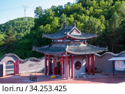 China, Heihe, July 2019: Taoist temple outside the city in Heihe in the summer. Редакционное фото, фотограф Катерина Белякина / Фотобанк Лори