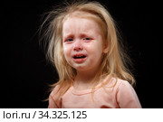 Portrait of Crying, Yelling, Abused Helpless Baby Girl After Family Conflict. Got Lost. In Difficulty. Family Conflict, Violence, Injustice, Unfairness. Стоковое фото, фотограф Иван Карпов / Фотобанк Лори