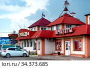 The town of Krymsk in Krasnodar region stores at the entrance to the city (2020 год). Редакционное фото, фотограф Владимир Ушаров / Фотобанк Лори