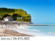 Etretat, France beach and cliff view over sky (2017 год). Стоковое фото, фотограф Сергей Новиков / Фотобанк Лори