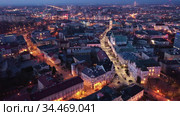 View from drone of lighted Rzeszow cityscape at spring twilight, Poland. Стоковое видео, видеограф Яков Филимонов / Фотобанк Лори