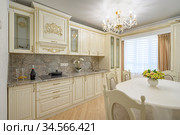 Luxury modern neoclassic beige kitchen interior. Стоковое фото, фотограф Сергей Старуш / Фотобанк Лори