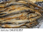 Fried smelt on a glass plate. Стоковое фото, фотограф Марина Володько / Фотобанк Лори