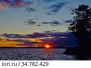 Last ray of the sun. Lake Keret, Northern Karelia, Russia. Стоковое фото, фотограф Сергей Трофименко / Фотобанк Лори