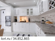 modern white wooden kitchen interior. Стоковое фото, фотограф Сергей Старуш / Фотобанк Лори