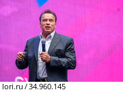 Arnold Schwarzenegger, famous actor, politician and businessman, speaks at a business forum (2019 год). Редакционное фото, фотограф Антон Гвоздиков / Фотобанк Лори