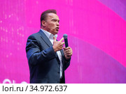Arnold Schwarzenegger, famous actor, politician and businessman, speaks at a business forum (2019 год). Редакционное фото, фотограф Антон Гвоздиков / Фотобанк Лори