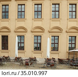 Photo of an empty street cafe in Germany. Lockdown in Europe. Стоковое фото, фотограф Restyler Viacheslav / Фотобанк Лори