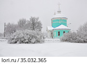 Серпуховской городской округ. Церковь Флора и Лавра в селе Игумново. Зима, февраль 2019. Russia, Moscow Region. Church of Saints Florus and Laurus in Igumnovo. Winter rural landscape, february 2019. Стоковое фото, фотограф Владимир Литвинов / Фотобанк Лори