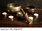 Tibetan singing bowls set with candles. Стоковое фото, фотограф Алексей Кузнецов / Фотобанк Лори