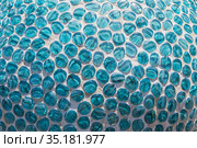 Blue glass pebbles cemented on a spherical surface. Стоковое фото, фотограф Юрий Бизгаймер / Фотобанк Лори