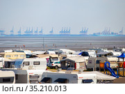 Camping by the Wadden Sea in Germany, Butjadingen, 16.08.2020. Редакционное фото, фотограф Restyler Viacheslav / Фотобанк Лори