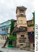 Beautiful Clock Tower of puppet theater Rezo Gabriadze in historical center of old Tbilisi, Georgia. Стоковое фото, фотограф Константин Лабунский / Фотобанк Лори