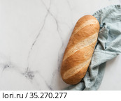British White Bloomer or Baton loaf bread. Стоковое фото, фотограф Ольга Сергеева / Фотобанк Лори