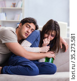Drunk husband abusing wife in domestic violence concept. Стоковое фото, фотограф Elnur / Фотобанк Лори