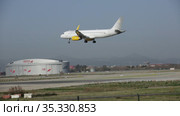 Large passenger airliner of Vueling Airlines with EC-MXP registration number landing in International El Prat Airport in Barcelona (2020 год). Редакционное видео, видеограф Яков Филимонов / Фотобанк Лори