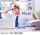 Young businessman asking for help in office. Стоковое фото, фотограф Elnur / Фотобанк Лори
