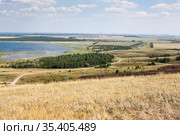 Rural road crossing hills and countryside, panorama. The Aslikul lake, the Republic of Bashkortostan, Russia. Стоковое фото, фотограф Кекяляйнен Андрей / Фотобанк Лори
