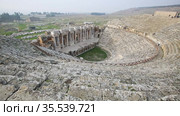 View of the Pamukkale Amphitheater, the ruined city of Hierapolis, Turkey. Стоковое видео, видеограф Яков Филимонов / Фотобанк Лори
