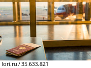 Airline tickets and documents on a background of an airplane. Стоковое фото, фотограф Константин Лабунский / Фотобанк Лори