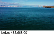 Озеро Байкал осенью. Хужирский залив. Вид с воздуха. Lake Baikal in autumn. Olkhon Island. Khuzhir bay. Aerial view. Стоковое видео, видеограф Евгений Романов / Фотобанк Лори