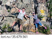 a mature sports couple on the top of Aleksandrovskaya Sopka mountain near the town of Zlatoust in the Chelyabinsk region in Russia. Стоковое фото, фотограф Акиньшин Владимир / Фотобанк Лори