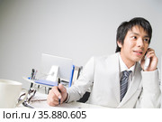 Japanese office worker. Стоковое фото, агентство Ingram Publishing / Фотобанк Лори