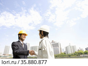 Workman and businessman. Стоковое фото, агентство Ingram Publishing / Фотобанк Лори
