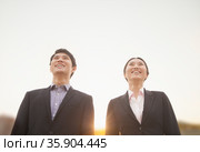 Young business people smiling. Стоковое фото, агентство Ingram Publishing / Фотобанк Лори