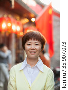 Portrait Of Mature Woman In Houhai, Beijing. Стоковое фото, агентство Ingram Publishing / Фотобанк Лори