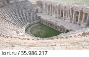 View of the Pamukkale Amphitheater, the ruined city of Hierapolis, Turkey. Стоковое видео, видеограф Яков Филимонов / Фотобанк Лори