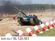 International Army games-2020. Tank biathlon. A tank with a Uzbekistan crew overcomes an obstacle antitank ditch. Moscow region, polygon "Alabino". Russia. Редакционное фото, фотограф Наталья Волкова / Фотобанк Лори