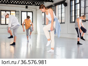 Young artists performing uncommon dance. Стоковое фото, фотограф Яков Филимонов / Фотобанк Лори