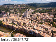 View from drone of Girona on bank of Onyar river. Стоковое фото, фотограф Яков Филимонов / Фотобанк Лори