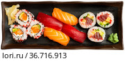 Set of different sushi - makis, uramaki and nigiris. Стоковое фото, фотограф Яков Филимонов / Фотобанк Лори