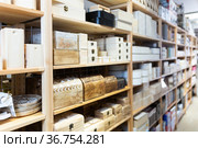 Supermarket of household goods - wooden original caskets on shelves. Стоковое фото, фотограф Яков Филимонов / Фотобанк Лори