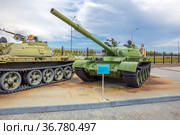 Russia, Verkhnyaya Pyshma, July 2021: Russian Tank T-62. On the open area of the military equipment museum "Military Glory of the Urals" on a sunny summer day. Редакционное фото, фотограф Акиньшин Владимир / Фотобанк Лори