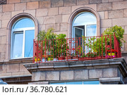 beautiful vintage balcony decorated with flowers (2021 год). Стоковое фото, фотограф Акиньшин Владимир / Фотобанк Лори