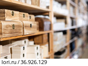 Wooden caskets on supermarket shelves. Стоковое фото, фотограф Яков Филимонов / Фотобанк Лори