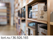Wooden caskets on supermarket shelves. Стоковое фото, фотограф Яков Филимонов / Фотобанк Лори