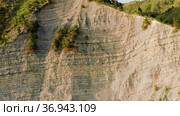 Скалистое побережье Черного моря в лучах заката. Вид с воздуха. The rocky coast of the Black Sea in the sunset. Aerial view. Стоковое видео, видеограф Евгений Романов / Фотобанк Лори