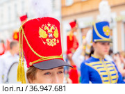 Russia, Samara, July 2019: a beautiful girl in a hussar costume on Kuibyshev street at the carnival dedicated to the World Cup. Редакционное фото, фотограф Акиньшин Владимир / Фотобанк Лори