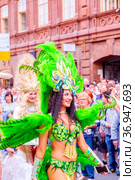 Russia, Samara, July 2019: processions of beautiful dressed up girls on Kuibyshev street at the carnival dedicated to the World Cup. Редакционное фото, фотограф Акиньшин Владимир / Фотобанк Лори