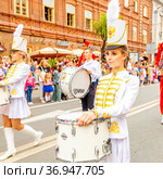 Russia, Samara, July 2019: a beautiful girl in a hussar costume on Kuibyshev street at the carnival dedicated to the World Cup. Редакционное фото, фотограф Акиньшин Владимир / Фотобанк Лори