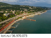 Черноморское побережье. Хоста - район города-курорта Сочи. Вид с воздуха. Black Sea coast, cape Vidny. Khosta - a district of the resort city of Sochi. Aerial view. (2021 год). Стоковое фото, фотограф Евгений Романов / Фотобанк Лори