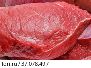 A piece of raw red meat beef fillet close-up. Food background. Source of vitamins B, A, amino acids, protein, collagen, choline. Стоковое фото, фотограф Светлана Евграфова / Фотобанк Лори