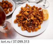 Chipirones, breaded fried calamari with lemon. Стоковое фото, фотограф Яков Филимонов / Фотобанк Лори