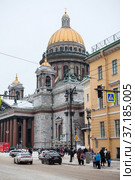 The Saint Isaac's Cathedral or Isaakievskiy Sobor at winter season. It is a large architectural landmark cathedral in city. Saint-Petersburg, Russia (2022 год). Редакционное фото, фотограф Кекяляйнен Андрей / Фотобанк Лори