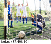 Goalkipper feeling sad about he didn't catch ball. Стоковое фото, фотограф Яков Филимонов / Фотобанк Лори