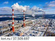 Сургут. Гидроциркуляционная электростанция (ГРЭС-2). Крупнейшая тепловая электростанция в России. Вид с воздуха. Surgut. Hydro-circulation power plant (GRES-2). The largest thermal power plant in Russia. Aerial view. Стоковое фото, фотограф Евгений Романов / Фотобанк Лори